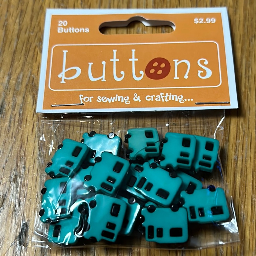20 Turquoise and black plastic buttons $1 if bundled